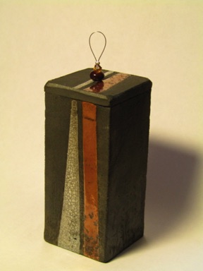 Lidded box with raku glaze